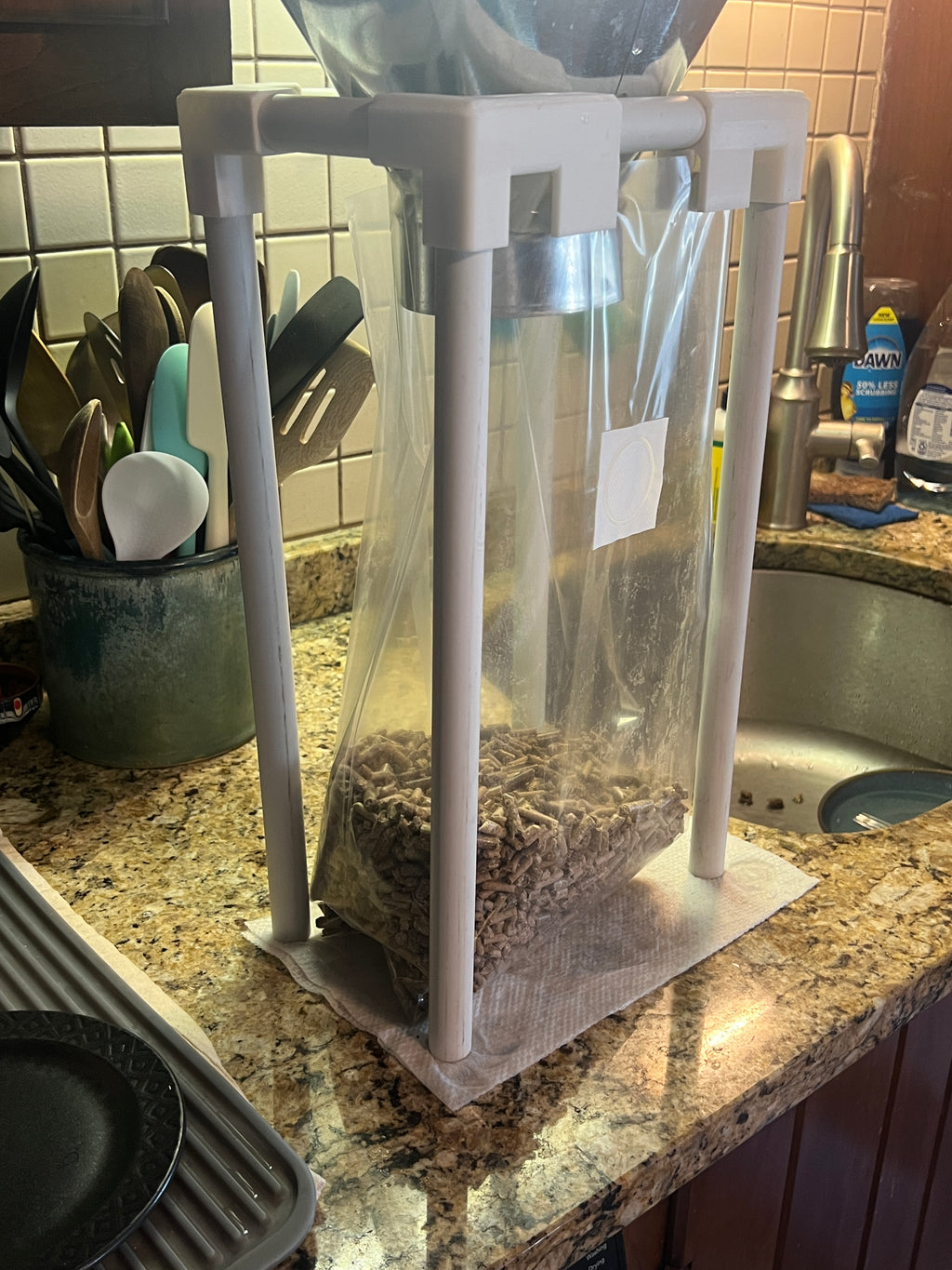 Speed Bagger with secure brackets for bagging, hydrating pellets and spawn